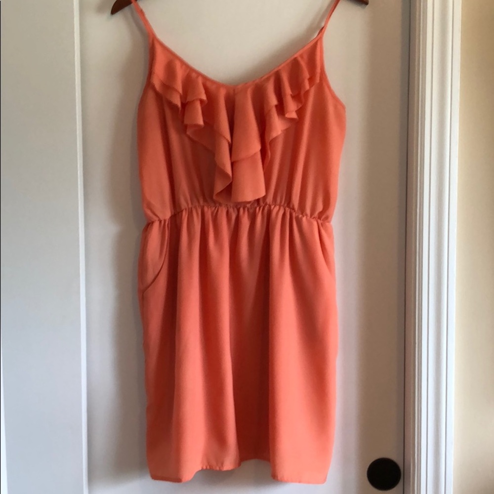 Dress With Front Ruffle And Pockets!